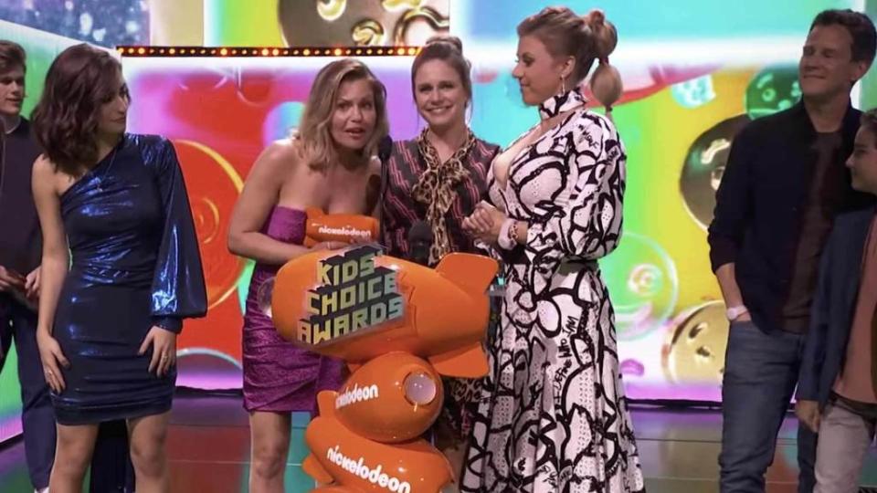 <p>“Fuller House” took home a big award at Saturday night’s Nickelodeon’s Kids’ Choice Awards and the cast seemingly threw their support behind Lori Loughlin during their acceptance speech. The hit Netflix series took home the prize for Favorite Funny TV Show and in accepting the awards, the show’s stars — Candace Cameron Bure, Andrea Barber, and Jodie Sweetin […]</p> <p>The post <a rel="nofollow noopener" href="https://theblast.com/fuller-house-lori-loughlin-at-kids-choice-awards/" target="_blank" data-ylk="slk:‘Fuller House’ Cast Seems to Reference Lori Loughlin Scandal at Kids’ Choice Awards;elm:context_link;itc:0;sec:content-canvas" class="link ">‘Fuller House’ Cast Seems to Reference Lori Loughlin Scandal at Kids’ Choice Awards</a> appeared first on <a rel="nofollow noopener" href="https://theblast.com" target="_blank" data-ylk="slk:The Blast;elm:context_link;itc:0;sec:content-canvas" class="link ">The Blast</a>.</p>