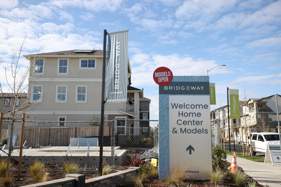 NEWARK, CALIFORNIA - DECEMBER 15: Signs are posted in front of homes at the Lennar Bridgeway home development on December 15, 2021 in Newark, California. Homebuilder Lennar will report fourth quarter earnings today after the closing bell. (Photo by Justin Sullivan/Getty Images)