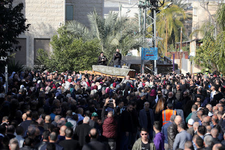 Relatives and friends carry the coffin of Aiia Maasarwe, 21, an Israeli student killed in Melbourne, during her funeral in her home town of Baqa Al-Gharbiyye, northern Israel January 23, 2019. REUTERS/Ammar Awad