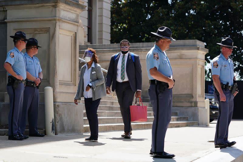 Georgia State Patrol officers are seen outside the Georgia State Capitol building in Atlanta