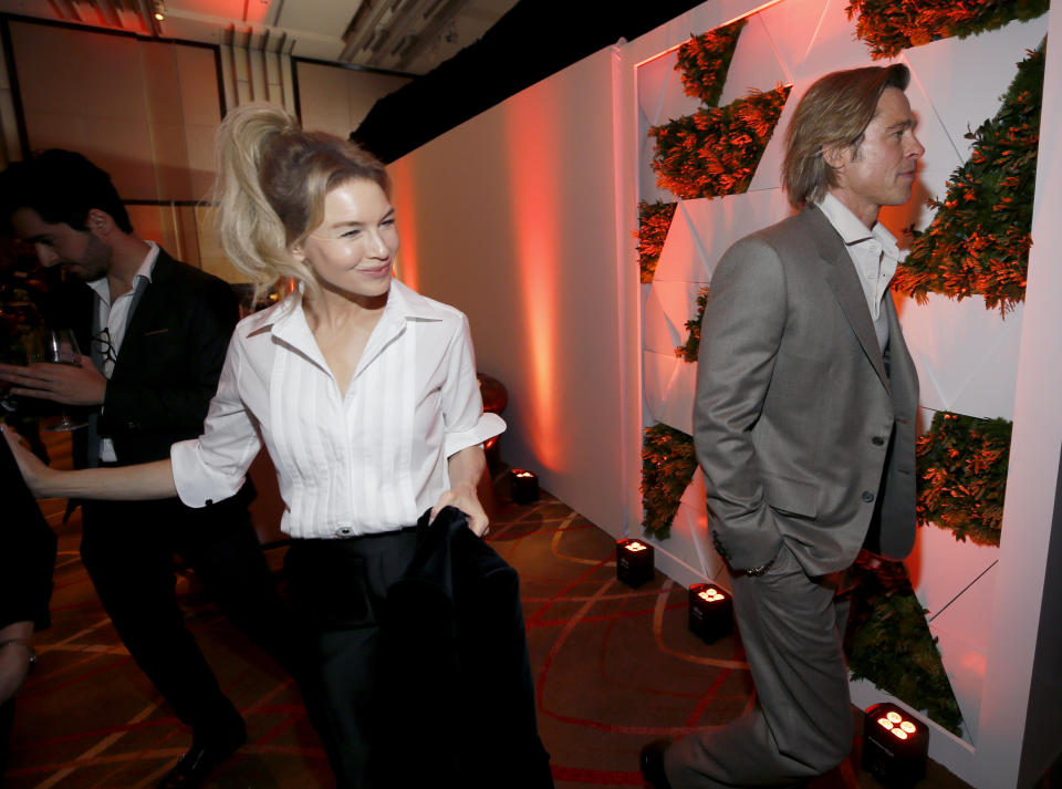 Renee Zellweger, left, and Brad Pitt are seen at the 92nd Academy Awards Nominees Luncheon at the Loews Hotel on Monday, Jan. 27, 2020, in Los Angeles. (Photo by Danny Moloshok/Invision/AP)