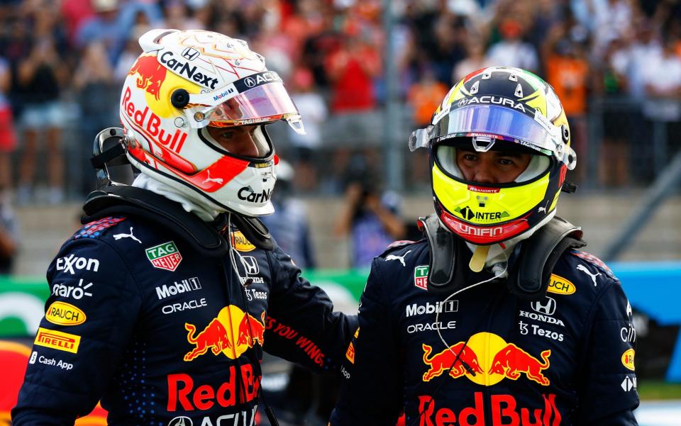  First place qualifier Max Verstappen of Netherlands and Red Bull Racing and third place qualifier Sergio Perez of Mexico and Red Bull Racing celebrate in parc ferme during qualifying ahead of the F1 Grand Prix of USA at Circuit of The Americas on October 23, 2021 in Austin, Texas - Jared C. Tilton/Getty Images