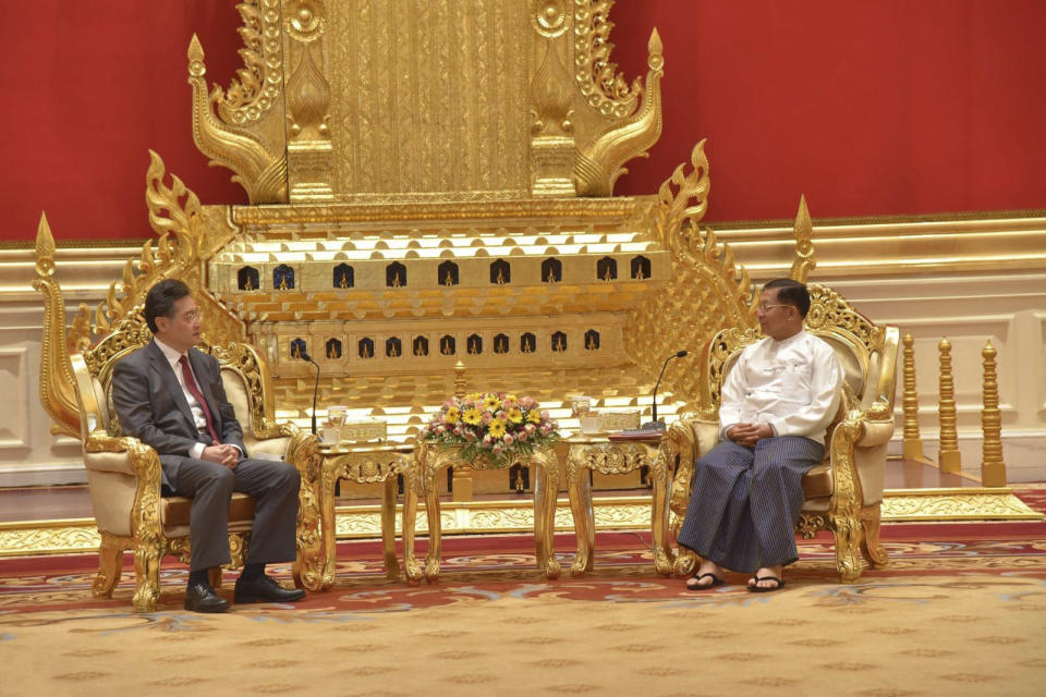 In this photo provided by the Myanmar Military True News Information Team, Senior Gen. Min Aung Hlaing, right, head of the military council, talks with Chinese Foreign Minister Qin Gang, left, during their meeting Tuesday, May 2, 2023, in Naypyitaw, Myanmar.The head of Myanmar's military-controlled government, Senior Gen. Min Aung Hlaing, met Tuesday with the visiting foreign minister of China, one of the army regime's closest allies offering key support to its continued rule since seizing power two years ago. (Military True News Information Team via AP)