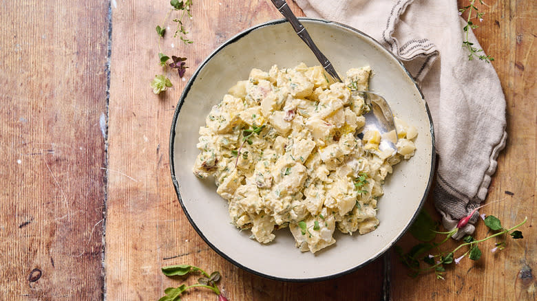 bowl of potato salad on table