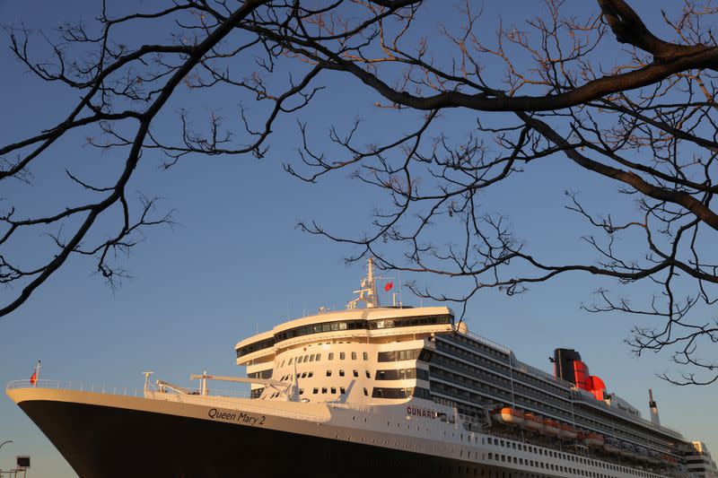 The Queen Mary 2 cruise ship by Cunard Line, owned by Carnival Corporation & plc. is seen docked at Brooklyn Cruise Terminal as the Omicron coronavirus variant continues to spread in Brooklyn, New York City