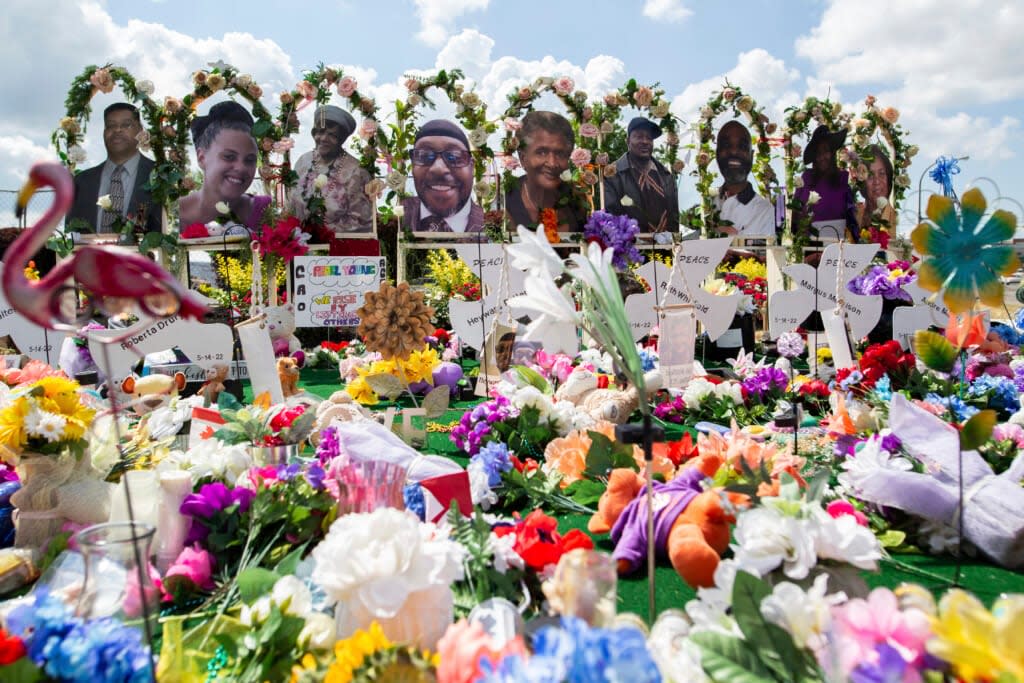 A memorial for the supermarket shooting victims is set up outside the Tops Friendly Market on Thursday, July 14, 2022, in Buffalo, N.Y. (AP Photo/Joshua Bessex)