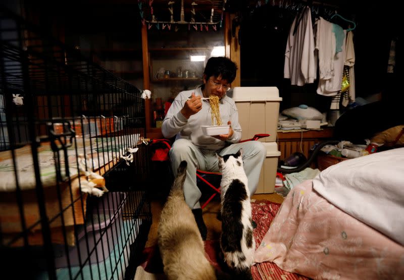 The Wider Image: The man who saves forgotten cats in Fukushima's nuclear zone