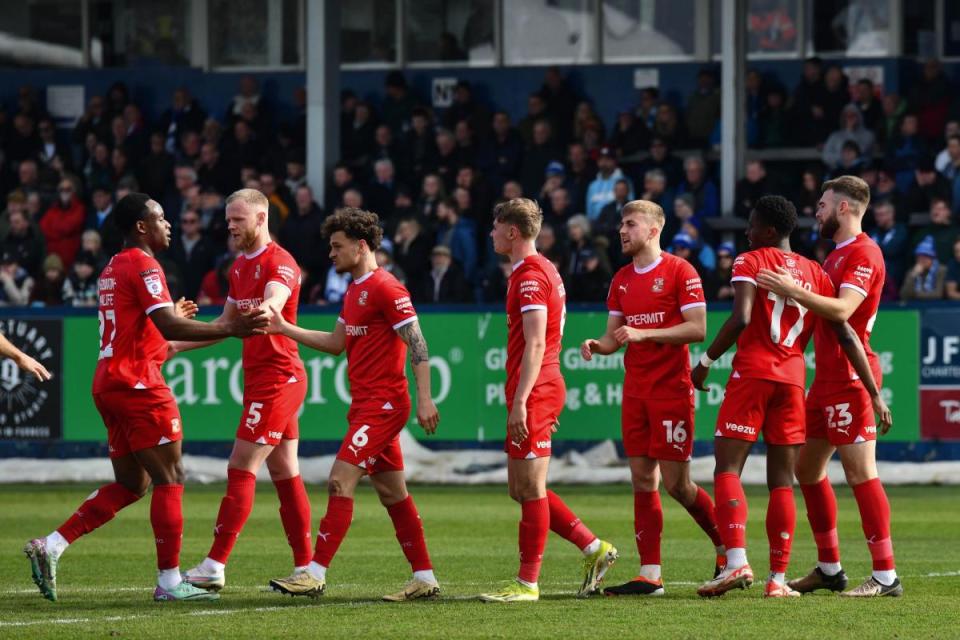 Kokolo celebrates his first Swindon goal <i>(Image: Callum Knowles)</i>