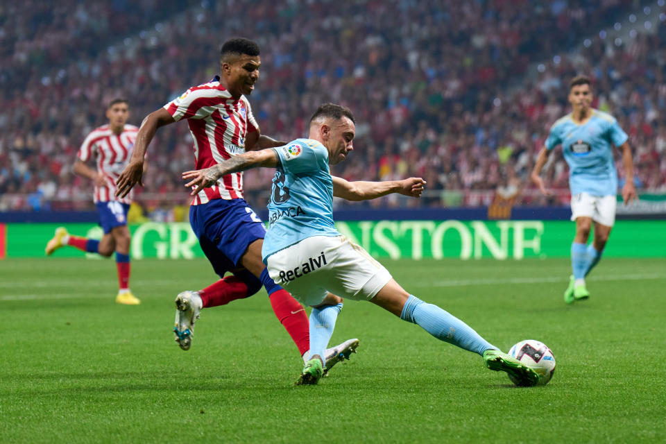 MADRID, SPAIN - SEPTEMBER 10: Iago Aspas of RC Celta is challenged by Reinildo Mandava of Atletico de Madrid during the LaLiga Santander match between Atletico de Madrid and RC Celta at Civitas Metropolitano Stadium on September 10, 2022 in Madrid, Spain. (Photo by Angel Martinez/Getty Images)