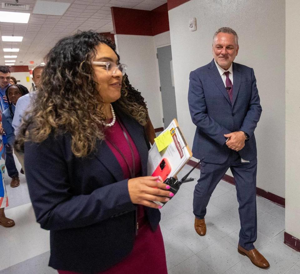 Lauderdale Lakes, Florida, August 21, 2023 - Broward Schools Superintendent Peter Licata, right, is led around the halls of Lauderdale Lakes Middle School by Principal Linda Lopez, left, during a visit on the first day of school in Broward County.