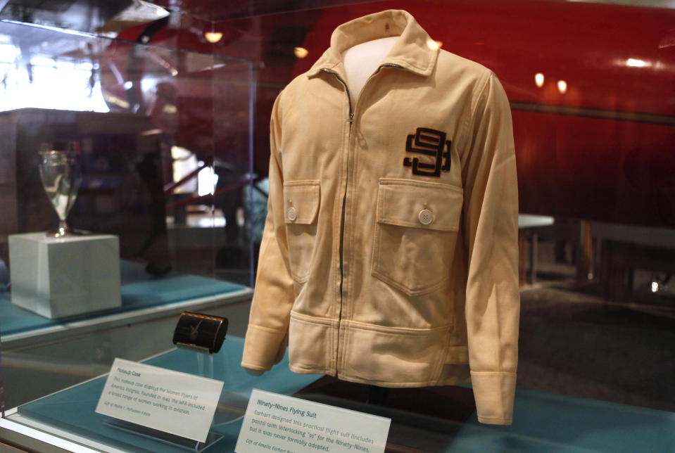 FILE - A flight suit jacket designed by Amelia Earhart is seen on display at the Smithsonian's National Air and Space Museum in Washington, Tuesday, Nov. 16, 2010, after an overhaul of one of the museum's original galleries, the "Pioneers of Flight". The jacket is from a suit called the "Ninety-Nines Flying Suit." (AP Photo/Jacquelyn Martin, File)