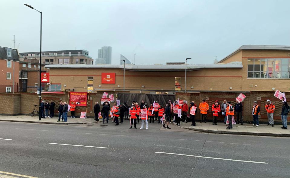 Royal Mail workers picket in north London (PA)