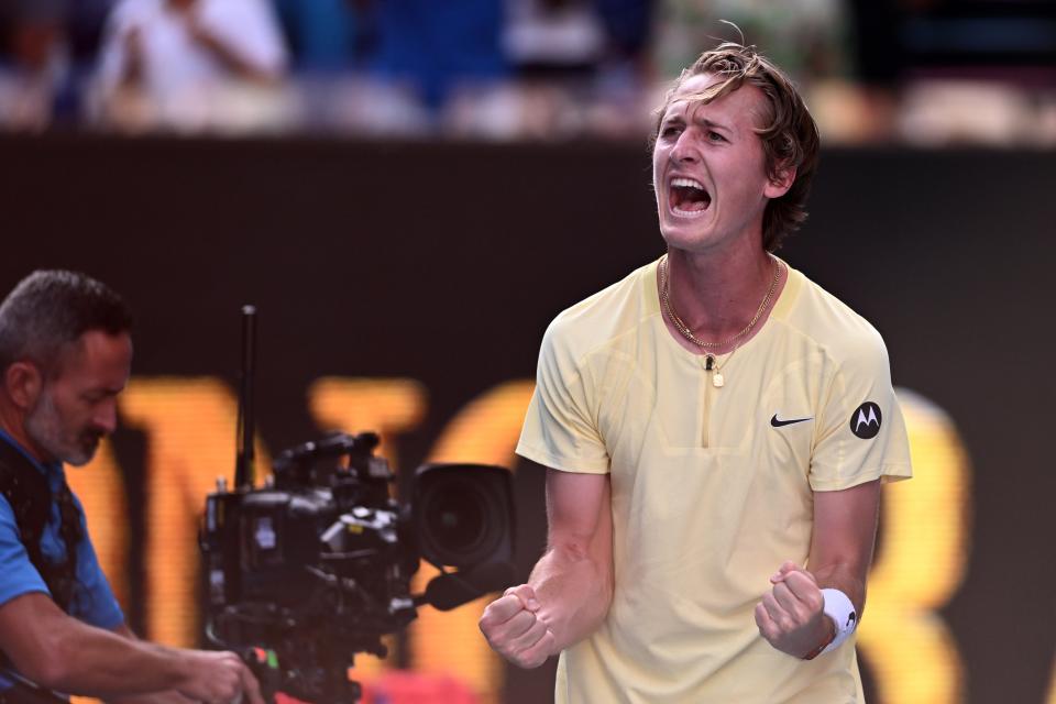 Sebastian Korda of the USA celebrates his 4th round win over Hubert Hurkacz (EPA)