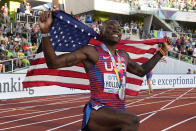 Gold medalist Grant Holloway, of the United States, poses after a final in the men's 110-meter hurdles the at the World Athletics Championships on Sunday, July 17, 2022, in Eugene, Ore.(AP Photo/Charlie Riedel)