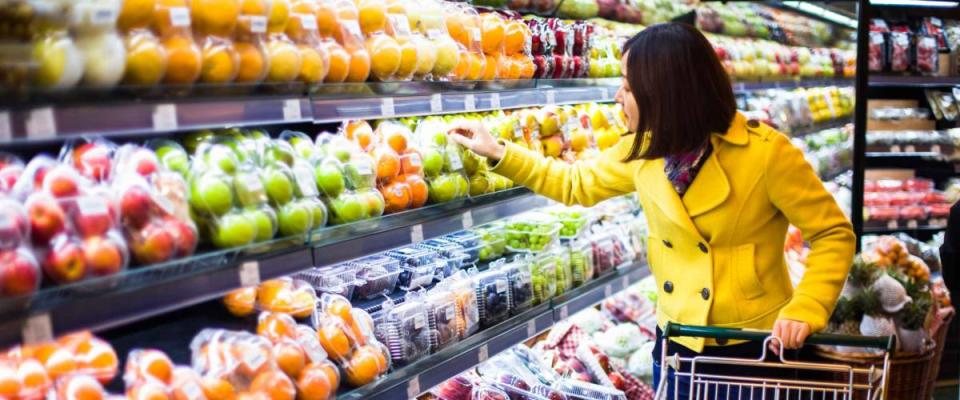 Young woman shopping in the supermarket