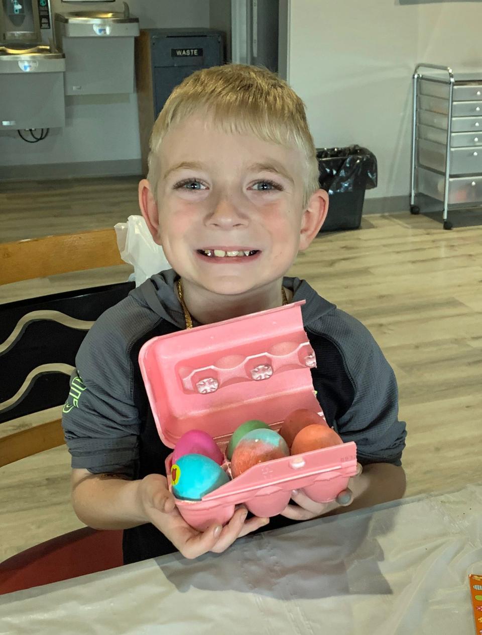 A young visitor enjoys Easter activities at the Park Place Youth Center at Tuscora Park.