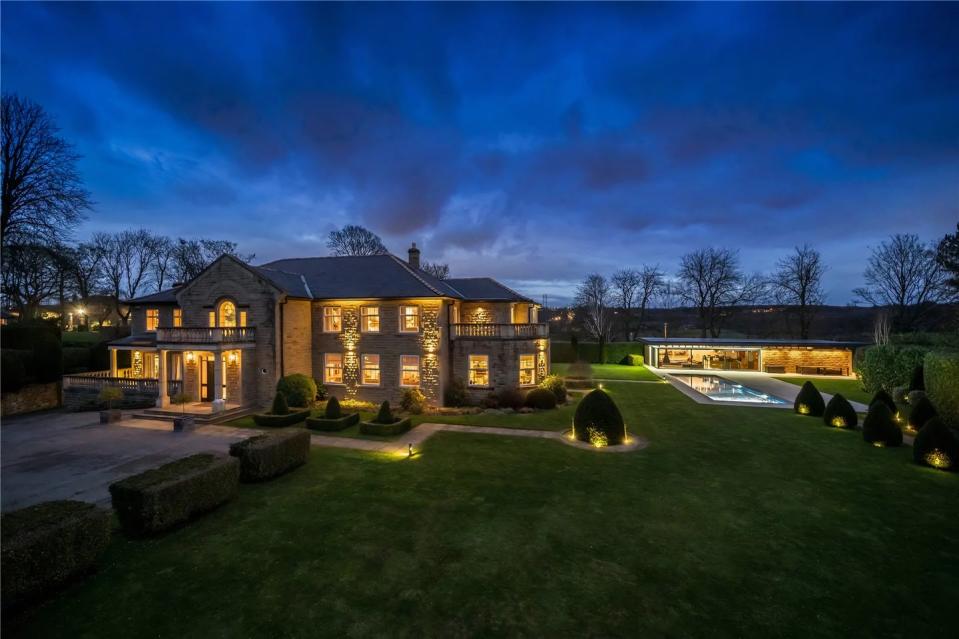 <p>This house in West Yorkshire is a real head-turner. Boasting six sprawling bedrooms, a <a href="https://www.housebeautiful.com/uk/garden/a36591989/outdoor-cinema-ideas/" rel="nofollow noopener" target="_blank" data-ylk="slk:cinema;elm:context_link;itc:0;sec:content-canvas" class="link ">cinema</a>, games room and a home automation system with CCTV, it's a complete dream. Tempted? You'll need £2.3 million to make this home your own...</p><p>This property is currently on the market for £2,375,000 with Fine & Country via <a href="https://www.zoopla.co.uk/for-sale/details/57921106/" rel="nofollow noopener" target="_blank" data-ylk="slk:Zoopla;elm:context_link;itc:0;sec:content-canvas" class="link ">Zoopla</a>.</p>
