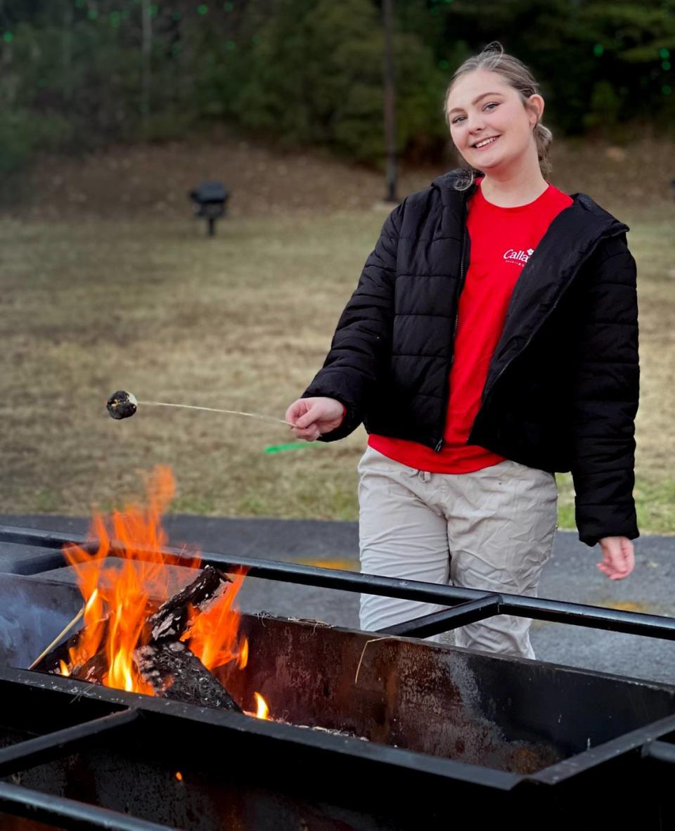 Makayla McClendon makes s’mores at Fantasy in Lights. This is the the 30th anniversary of Fantasy in Lights at Callaway Resort & Gardens. It features more than 10 million lights this year, and is Callaway Gardens’ kickoff to the holiday season, Rachael McConnell, marketing manager at Callaway Gardens. 11/18/2022