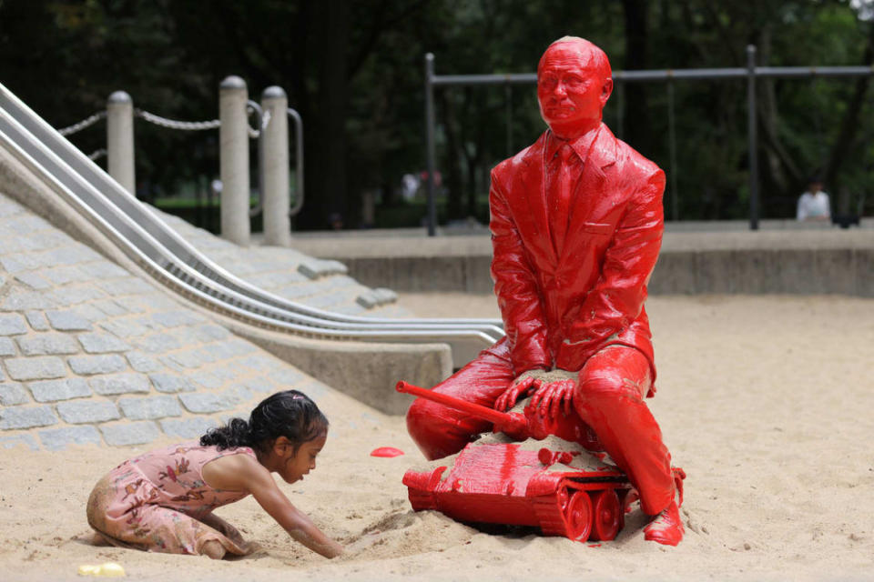 <div class="inline-image__caption"><p>A child plays by a statue of Russian President Vladimir Putin riding a tank created by French artist James Colomina in Central Park in Manhattan, New York City, U.S., August 2, 2022.</p></div> <div class="inline-image__credit">Andrew Kelly/Reuters</div>