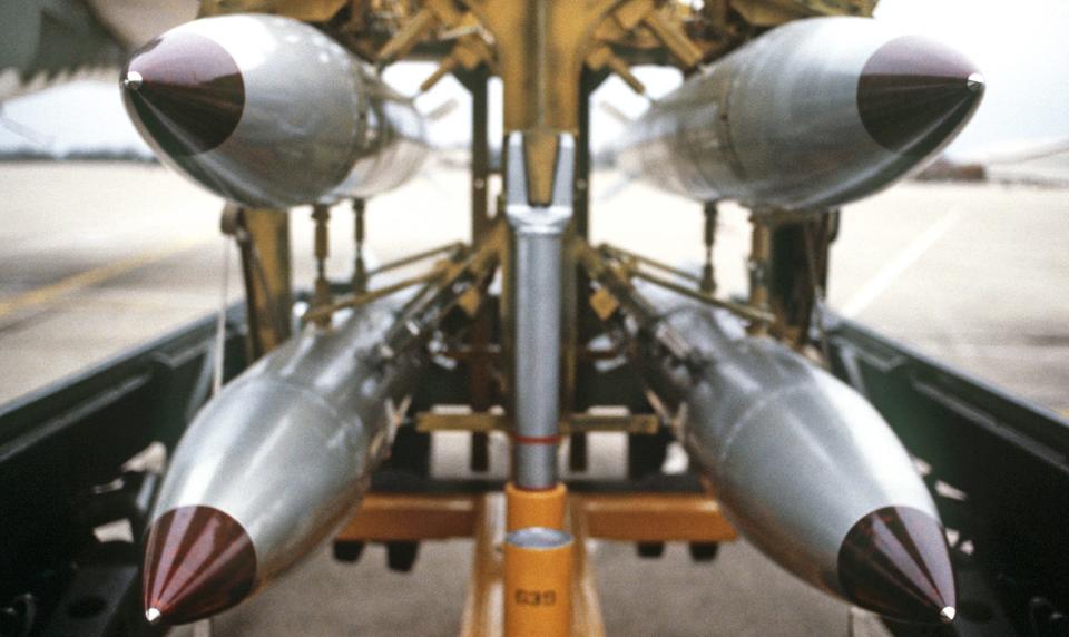 A quartet of B61-series bombs loaded on a dolly. <em>DOD</em>