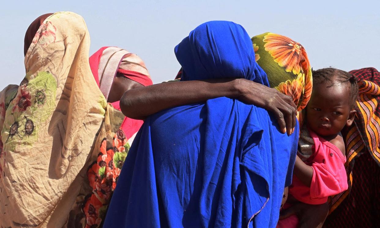 <span>Women from Geneina in a refugee camp in Adré, Chad in November.</span><span>Photograph: El Tayeb Siddig/Reuters</span>