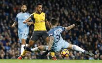 <p>Britain Football Soccer – Manchester City v Arsenal – Premier League – Etihad Stadium – 18/12/16 Arsenal’s Theo Walcott in action with Manchester City’s Nicolas Otamendi Action Images via Reuters / Carl Recine Livepic EDITORIAL USE ONLY. No use with unauthorized audio, video, data, fixture lists, club/league logos or “live” services. Online in-match use limited to 45 images, no video emulation. No use in betting, games or single club/league/player publications. Please contact your account representative for further details. </p>