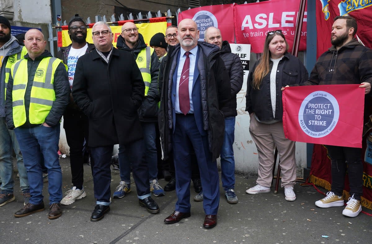 Mick Whelan, general secretary of the train drivers’ union, Aslef, during a previous strike (PA)