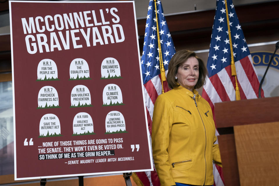 Speaker of the House Nancy Pelosi, D-Calif., reflects on bills that have passed the House but die in the Senate because Senate Majority Leader Mitch McConnell, R-Ky., does not bring them up for a vote, during a news conference on Capitol Hill in Washington, Thursday, June 13, 2019. Reacting to President Donald Trump's statement that he would accept assistance from a foreign power, Pelosi said it's so against any sense of decency. An avid sports fan, Pelosi is wearing the colors of the Golden State Warriors colors, a gold jacket with blue pants. (AP Photo/J. Scott Applewhite)