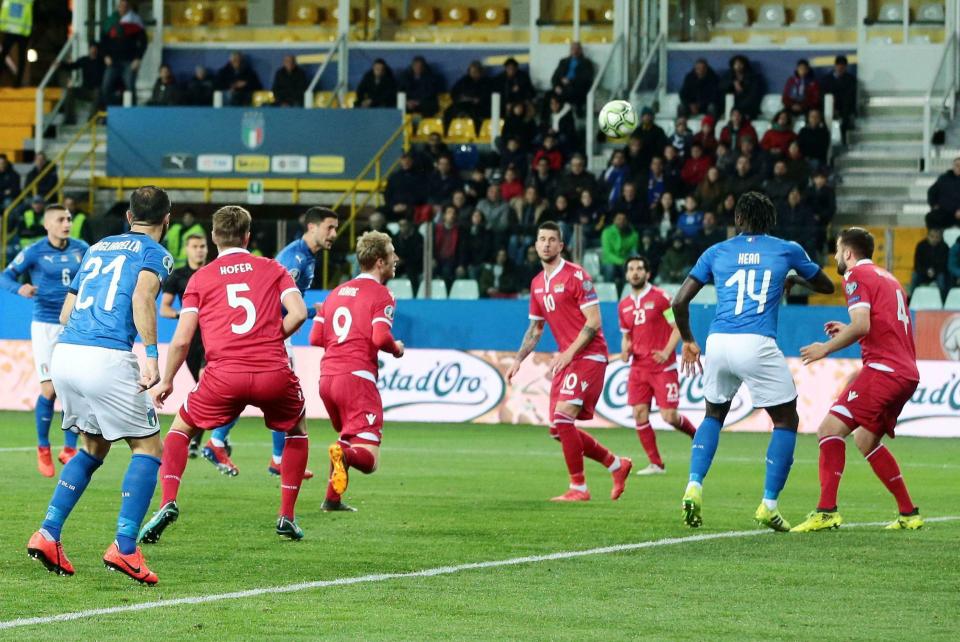 Italy's Stefano Sensi, third from left, scores his team's first goal during a Euro 2020 Group J qualifying soccer match between Italy and Liechtenstein, at the Ennio Tardini stadium in Parma, Italy, Tuesday, March 26, 2019. (Serena Campanini/ANSA via AP)