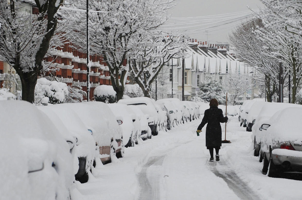 The scene on a street in Chiswick, London, as heavy snowfall hits the UK.