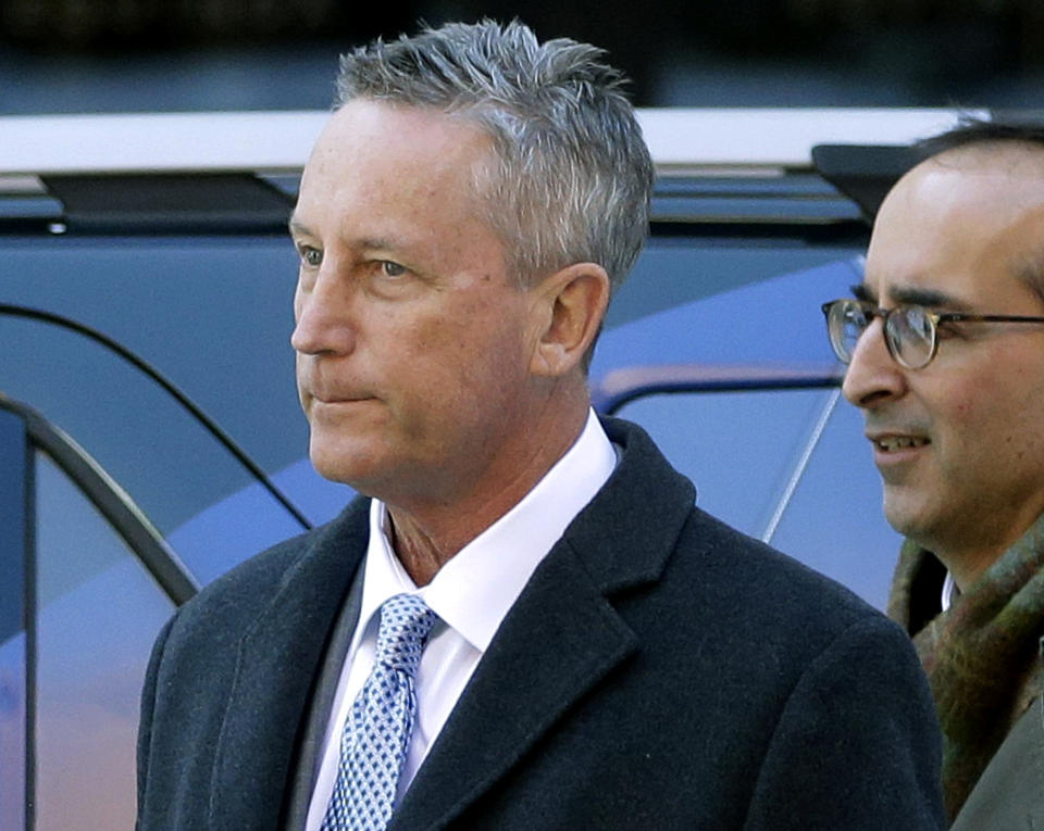 FILE - In this March 12, 2019 file photo, Martin Fox, from a private tennis academy in Houston, arrives at federal court in Boston to face charges in a nationwide college admissions bribery scandal. A total of 50 people have been charged, including 33 parents, 10 coaches and college athletics officials, and seven others. (AP Photo/Steven Senne, File)