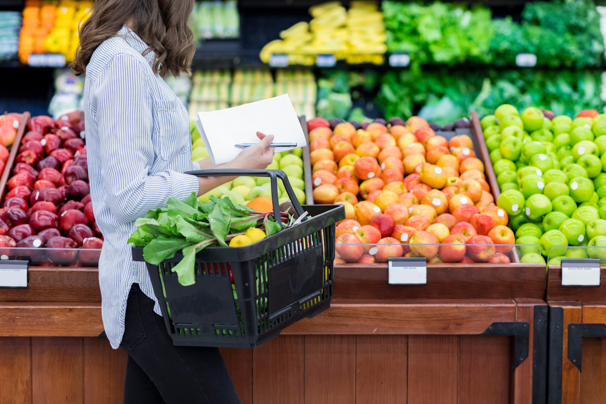 Woman shopping in the produce section