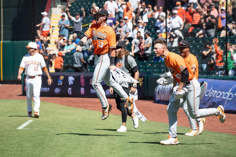 Oklahoma State's Nolan McLean jumps in the air after the Cowboys' 5-4 win over Texas in the Big 12 Tournament semifinals Saturday.