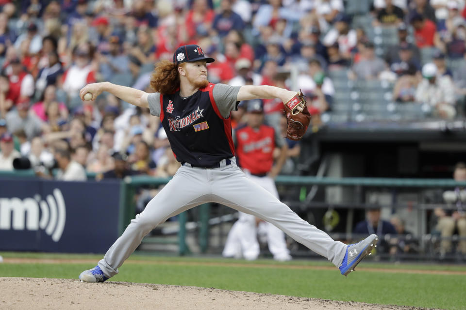 Dustin May, of the Los Angeles Dodgers, throws during the MLB All-Star Futures baseball game, Sunday, July 7, 2019, in Cleveland. The 90th MLB baseball All-Star Game will be played Tuesday. (AP Photo/Darron Cummings)