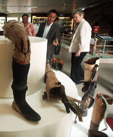 U.S. Under Secretary of State for Arms Control and International Security Rose Gottemoeller (R) walks past prosthetic legs at a mines and bombs museum in Vietnam's central Quang Tri province, in this March 2, 2015 file photo. REUTERS/Kham/Files