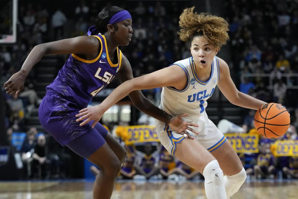 UCLA guard Kiki Rice drives against LSU guard Flau'jae Johnson during the third quarter of their Sweet 16 game Saturday.