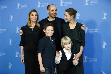 Cast members Nele Mueller-Stofen, Ivo Pietzcker, director Edward Berger, Georg Arms and Luise Heyer (L-R) attend a photocall to promote the movie "Jack" during the 64th Berlinale International Film Festival in Berlin February 7, 2014. REUTERS/Thomas Peter