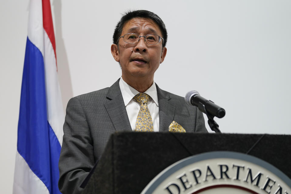 Manasvi Srisodapol, Ambassador of Thailand to the United States, speaks during a ceremony to return two stolen hand-carved sandstone lintels dating back to the 9th and 10th centuries to the Thai government Tuesday, May 25, 2021, in Los Angeles. The 1,500-pound (680-kilogram) antiquities had been stolen and exported from Thailand — a violation of Thai law — a half-century ago, authorities said, and donated to the city of San Francisco. They had been exhibited at the San Francisco Asian Art Museum. (AP Photo/Ashley Landis)