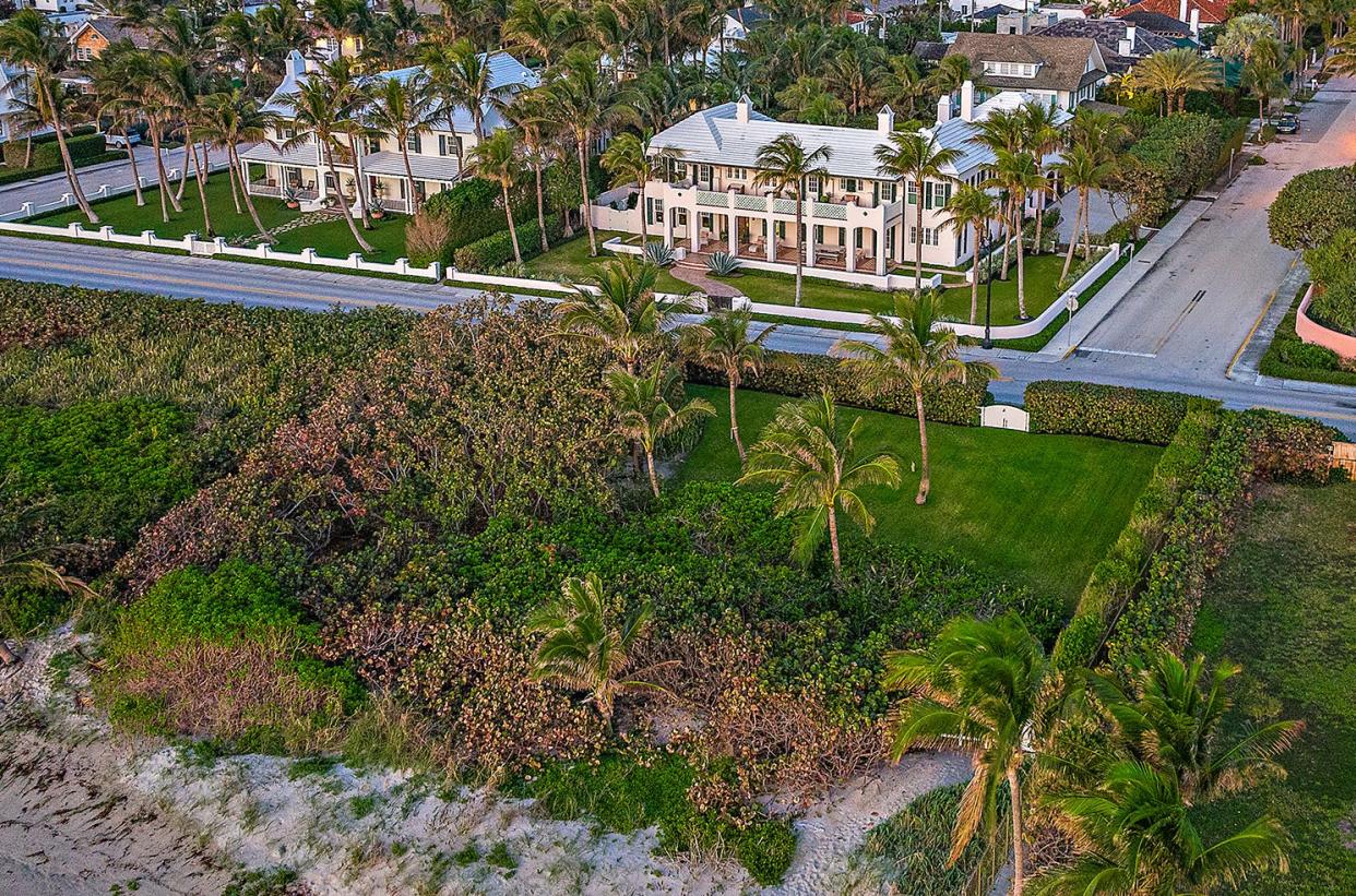 An aerial photo shows the vacant beach parcel that belongs to a Palm Beach house that just sold at 200 S. Ocean Blvd. for $51.25 million, according to the multiple listing service. The house's architecture was designed to complement the home next door, seen at the left.