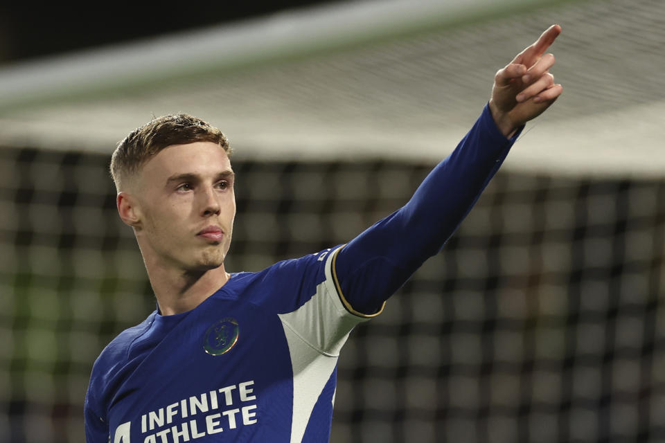 Chelsea's Cole Palmer celebrates after scoring his side's fifth goal during the English Premier League soccer match between Chelsea and Everton at Stamford Bridge stadium in London, Monday, April 15, 2024. (AP Photo/Ian Walton)