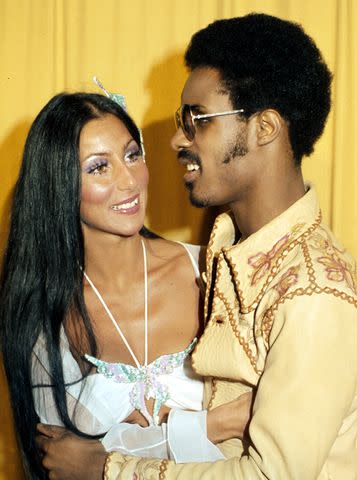 <p>Michael Ochs Archives/Getty </p> Cher and Stevie Wonder in Los Angeles in March 1974