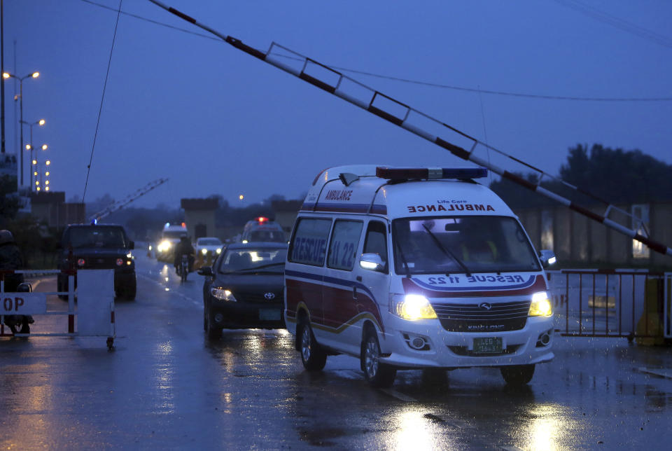 An ambulance carrying the body of Pakistani prisoner Shakir Ullah, who was killed by Indian inmates in an Indian jail, arriving from India at Pakistani-India border post Wagah, near Lahore, Pakistan, Saturday, March 2, 2019. Indian authorities have handed over the body of a Pakistani prisoner Ullah who was beaten to death by Indian inmates this month at an Indian jail apparently in retaliation for the Dec. 14 suicide bombing in Indian-controlled Kashmir that killed 40 soldiers. (AP Photo/K.M. Chaudary)