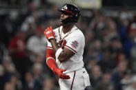 Atlanta Braves' Jorge Soler celebrates after single during the first inning in Game 5 of baseball's World Series between the Houston Astros and the Atlanta Braves Sunday, Oct. 31, 2021, in Atlanta. (AP Photo/Brynn Anderson)