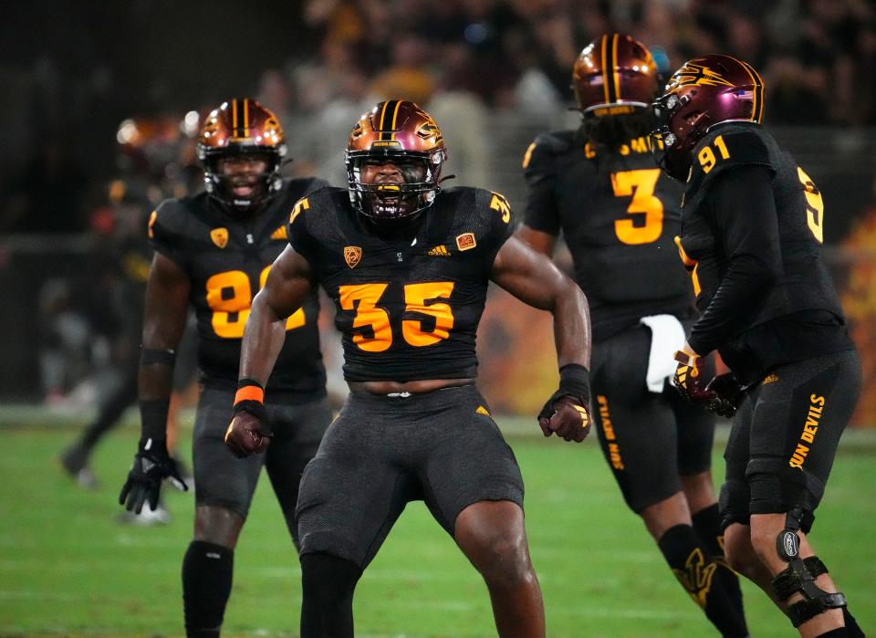 Arizona State Sun Devils defensive lineman B.J. Green II (35) reacts after sacking Oklahoma State Cowboys quarterback Alan Bowman (7) in the first half at Mountain America Stadium in Tempe on Sept. 9, 2023.