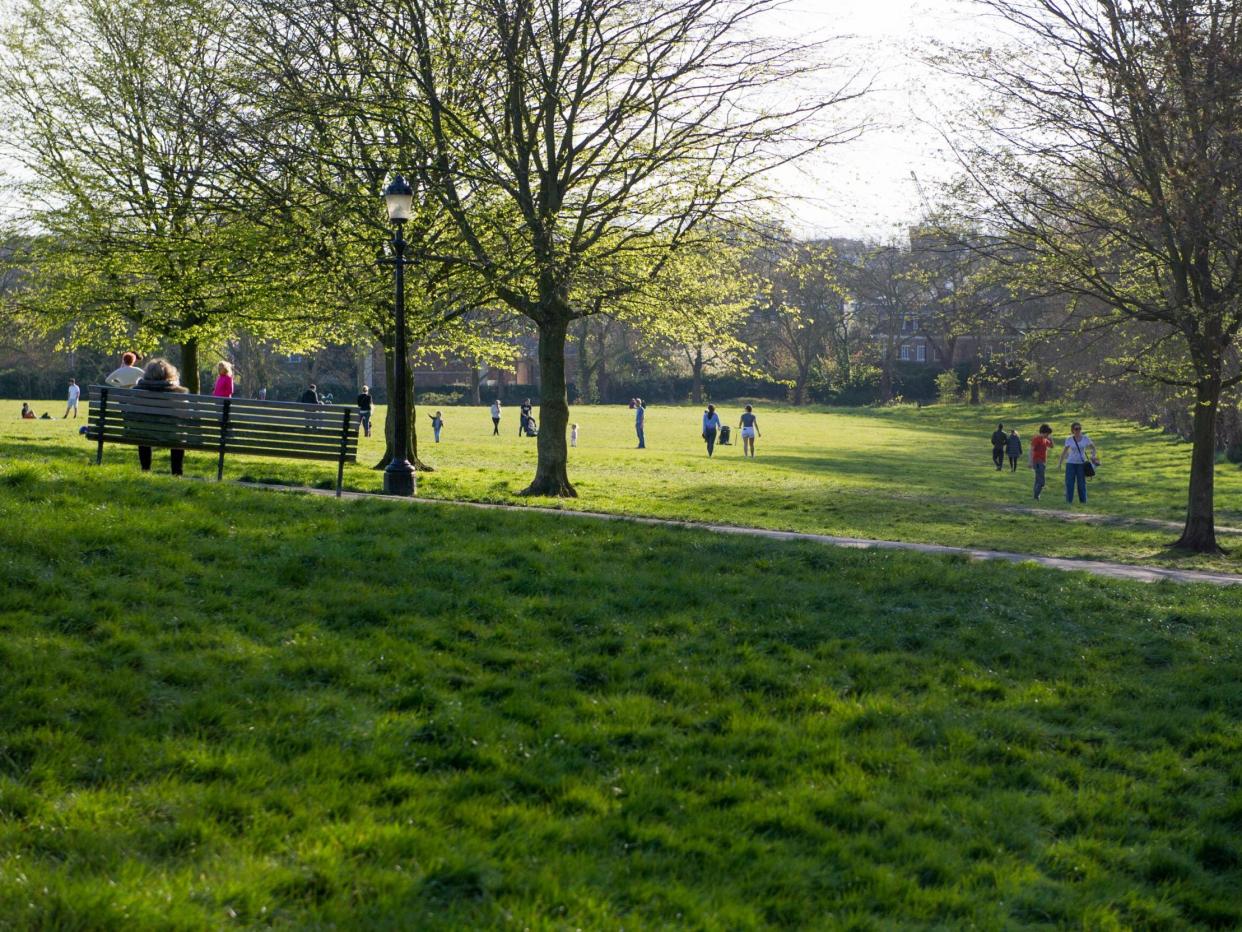 Members of the public in the sun on Primrose Hill on April 5, 2020 in London, England: Ollie Millington/Getty Images