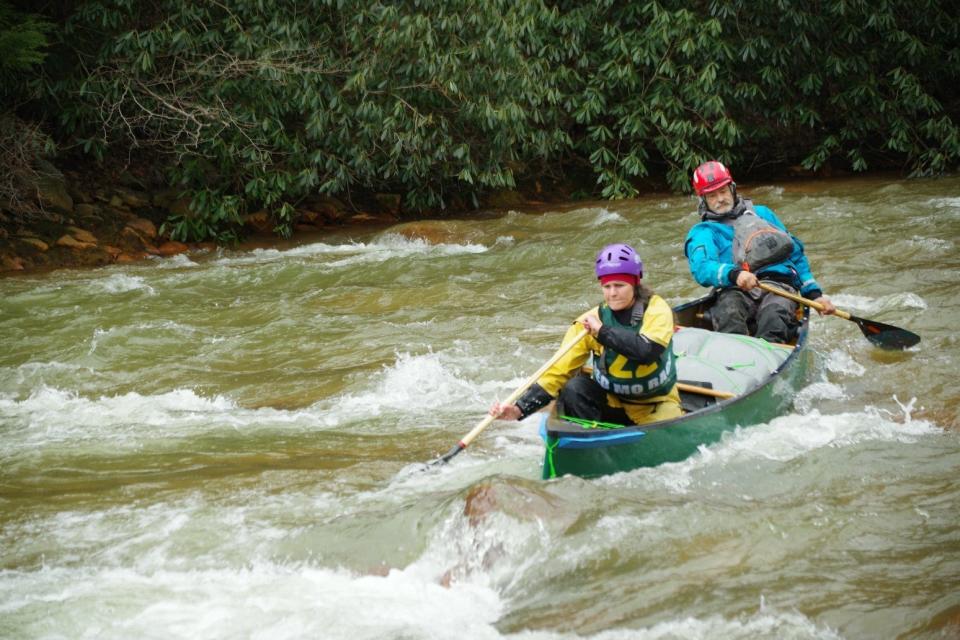 Mike Cook of Lansing, in back, participates in the Red Moshannon canoe race with his friend Susanna earlier this spring. The team came in 4th place in their category.