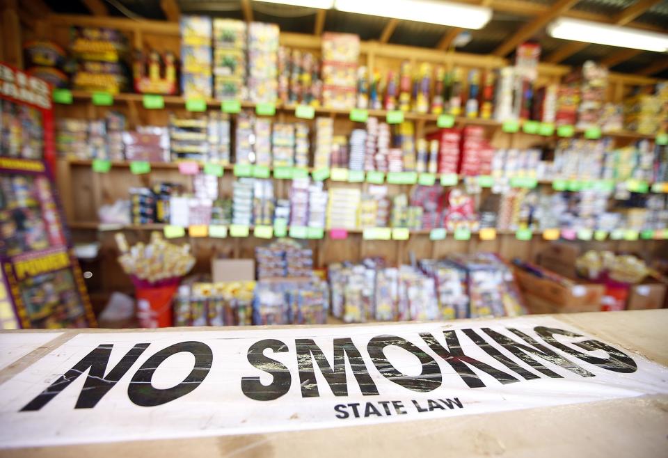 A no smoking sign on display at Pop's Fireworks stand at 84th Street and U.S. Highway 87 on Wednesday, June 22, 2016, in Lubbock, Texas.