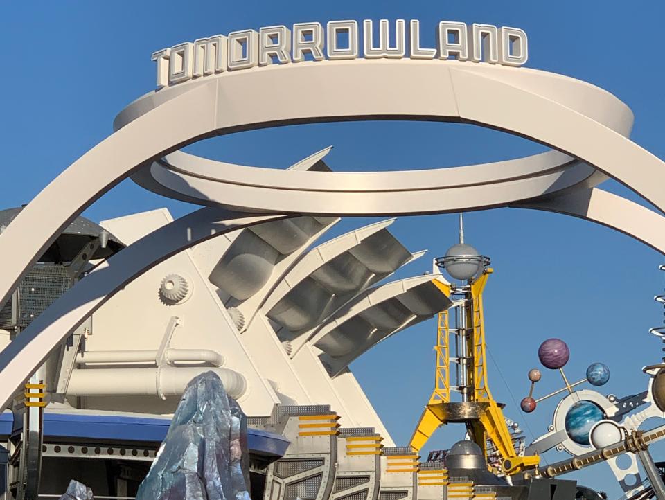 sign over the tomorrowland bridge at magic kingdom in disney world