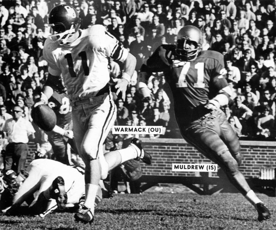 "Carrying the ball in one hand, OU's Bob Warmack runs away from Willie Muldrew of Iowa State" as the Sooners whipped the Cyclones 52-14 in Ames.
Staff photo taken 11/11/67; photo ran in the 11/12/67 Daily Oklahoman.
File:  Football/OU/OU-Iowa State/Bob Warmack/1967