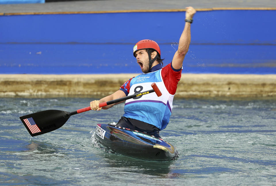 <p>Casey Eichfeld of USA celebrates after his run in the men’s canoe single final at Whitewater Stadium in Rio on August 9, 2016. (REUTERS/Lucy Nicholson) </p>